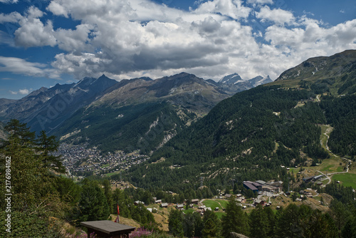 Zermatt with peaks above from Hermetji on hiking trail between Zermatt and Schwarzersee in Pennine Alps in Switzerland