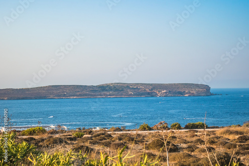 Beautiful landscape with the blue Mediterranean Sea and Comino Island on the horizon, Cirkewwa MALTA