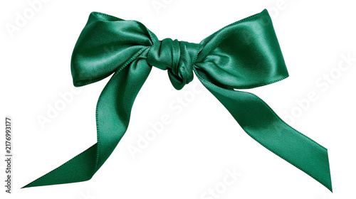 Obraz na płótnie Emerald green satin ribbon tied in a decorative bow with flowing ends