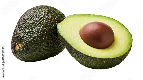 Quadro su tela Whole and halved ripe avocado with large brown seed