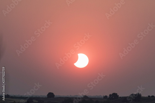 Canvastavla View of the partial solar eclipse, during partiality, in the countryside around