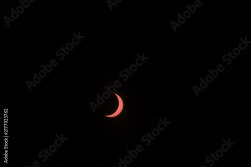 Konstfotografi View of the partial solar eclipse, during partiality, in the countryside around