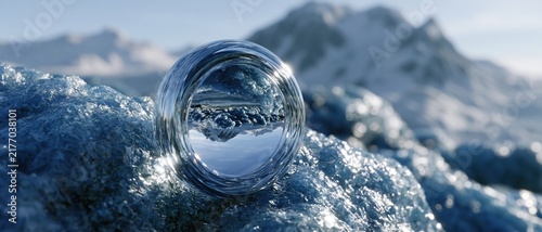Glass Sphere Reflecting Snowy Mountain Peaks