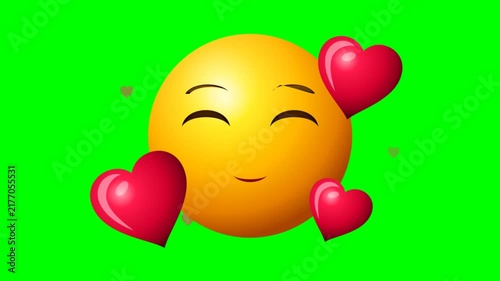Yellow Smiling Sphere Surrounded By Red Hearts Against Green Chroma Key Background