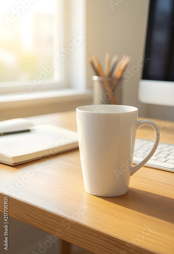 Workplace wellness and morning routine, white coffee mug on office desk with computer and notebook in sunlit home workspace for productivity and focus