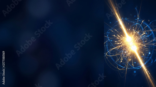 Abstract particle collision and nuclear fusion background with glowing golden energy beam and quantum atomic structure on dark blue
