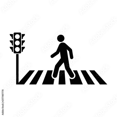 Black icon of a person walking on a crosswalk with a traffic light signal on the side Vector