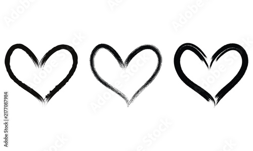 Three Hand-Drawn Brushstroke Heart Symbols