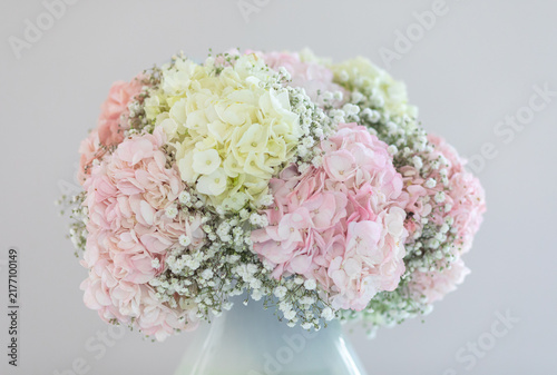 Hydrangeas and baby's breath bouquet creating gentle floral arrangement