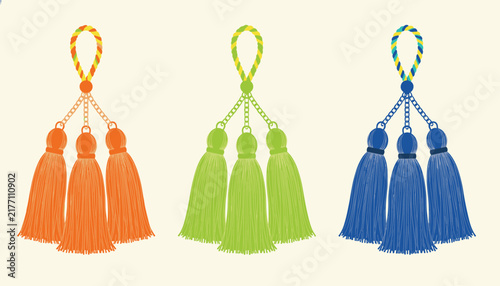 Set of three ornate triple tassels in bright orange lime green and royal blue colors with matching braided loops and silver chain accents.