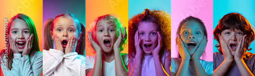 Fotografie Surprised teenagers react in colorful pop art portrait sequence