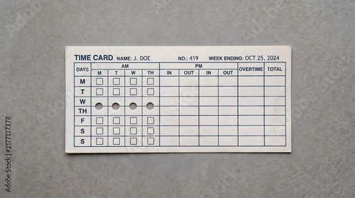 Time punch card with four holes and one empty slot, four day workweek concept