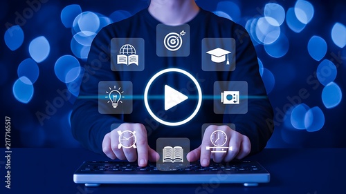 Online education concept with play button, learning icons and student using a laptop