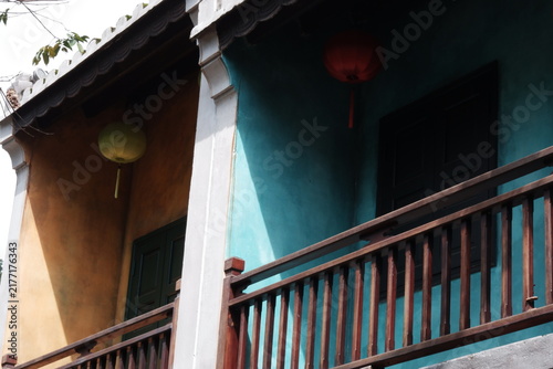Quadro su tela Low angle shot of historic Asian architecture featuring wooden railing and tradi