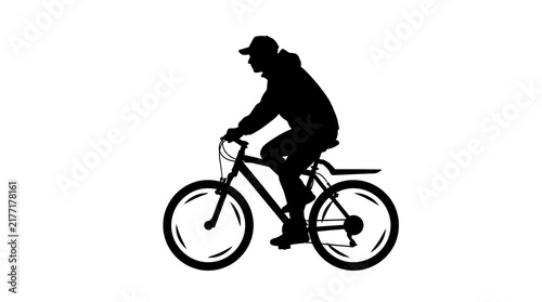Silhouette of a man riding a bicycle isolated on a white background