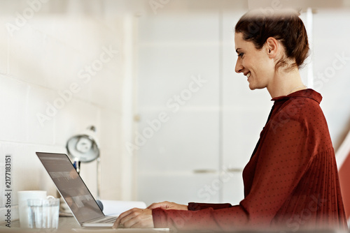 Obraz na płótnie Laptop, research and reading with business woman in office for account review, budget treasurer and planning