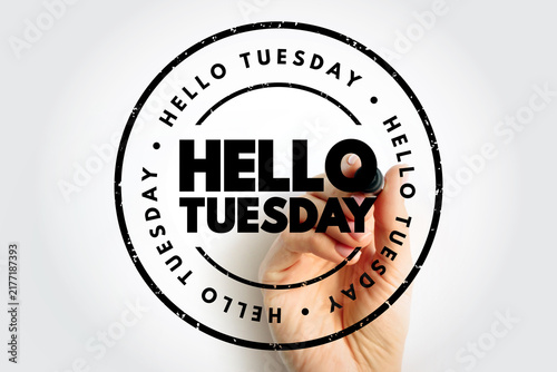 Konstfotografi Hello Tuesday written in bold circular stamp, representing weekday greetings, mo