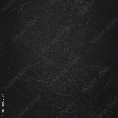 Dark grey black slate texture in natural pattern with high resolution for background and design art work. Black stone wall.