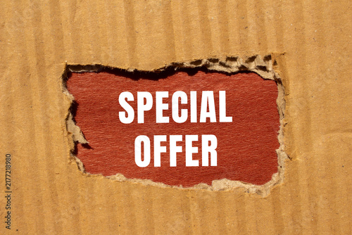 фотографія Special Offer message written on ripped torn paper background