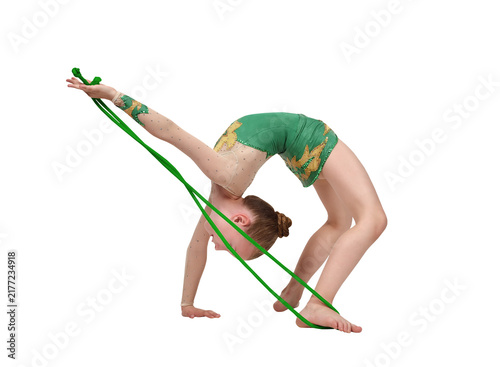 Child gymnast performing rhythmic gymnastics exercise with green rope.