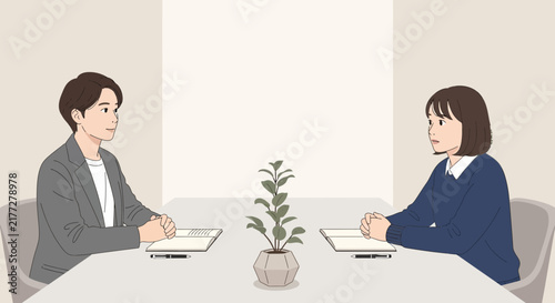 Business professionals discussing documents in modern office setting.