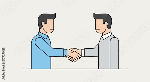 Business professionals shaking hands over a laptop during meeting.