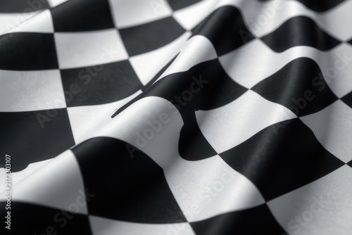 Close-up of black and white checkered racing flag detail, abstract pattern, texture, seamless pattern