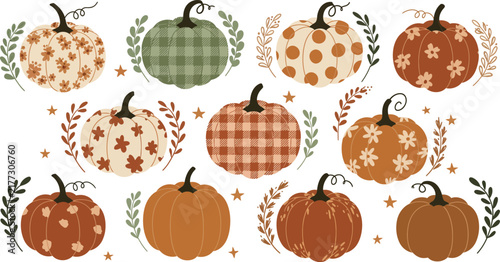A collection of decorative autumn pumpkins featuring various patterns and textures including plaid floral and solid colors for fall season design