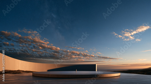 Minimalist product podium against dramatic sunset sky.