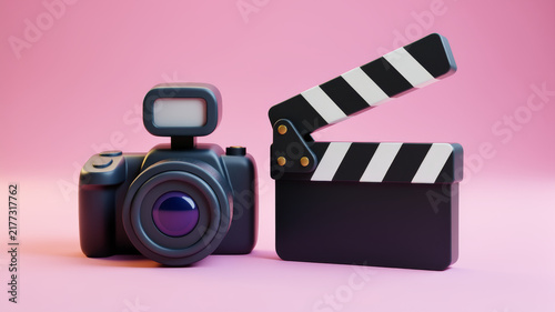 Black camera beside film clapperboard on pink background representing video production filmmaking content creation directing cinema storytelling and modern creator branding