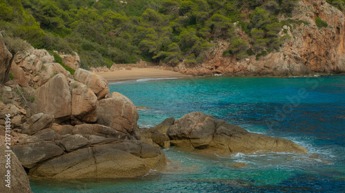 Serene coastal landscape with rocky shoreline and turquoise ocean water at golden hour ocean waves sea rocks coastal scenery sunset coast