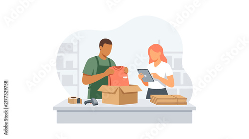 Warehouse Workers Packing Clothes for Shipment in E Commerce Business