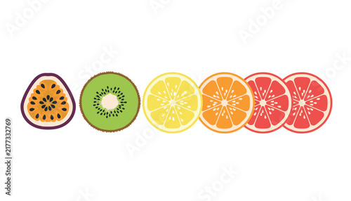 Vibrant flat lineup of sliced citrus and tropical fruits including passion fruit kiwi lemon orange and grapefruit on white.