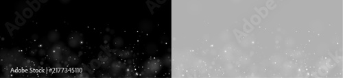 Tiny glowing particles drift across a dark background. The white spots vary in size and brightness with subtle bokeh effects. This creates a serene and ethereal atmosphere for overlay or.