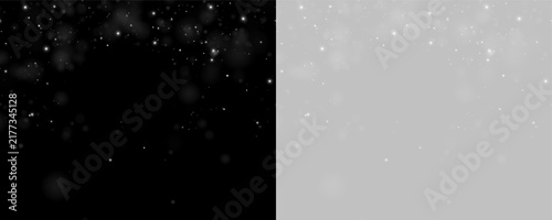 Tiny bright white particles clustered near the top edge. Scattered glowing dots with soft blurred halos on a black background. Ideal for cosmic, night sky, or abstract sparkle effects.