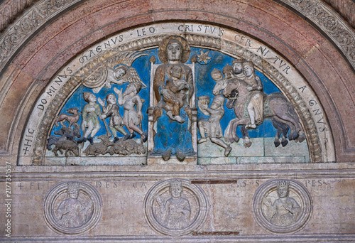 Medieval religious relief depicting Madonna and Child in Verona, Italy