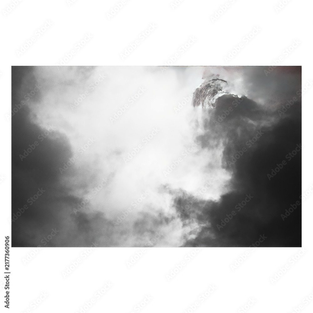 Fototapeta premium A grayscale photograph of thick, billowing smoke or clouds filling the frame, with a bright, overexposed white light source in the center.