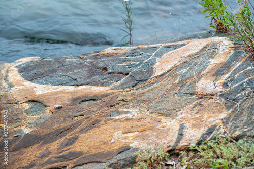 Принти на полотні Pink swirls in Canadian Shield granite on a shoreline of Georgian Bay, Ontario, Canada