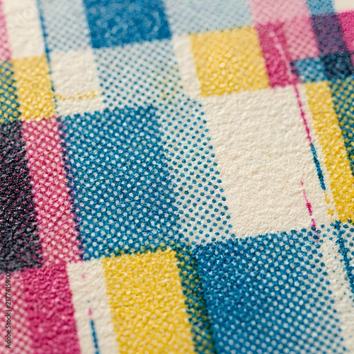 Papercraft style riso print grain texture on fine textured paper background close up