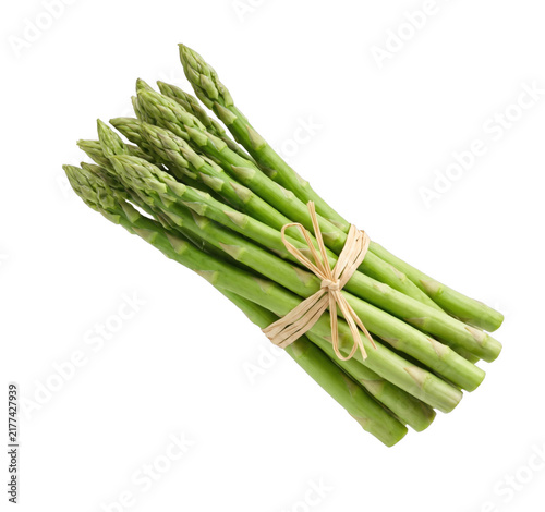 Foto Fresh green asparagus spears tied with natural twine on transparent background