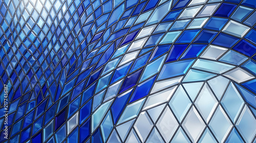 Abstract blue glass geometric pattern on modern building
