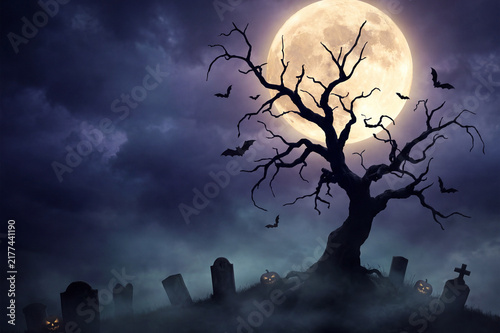 Spooky Halloween Background with Silhouette of Dead Tree and Full Moon at Night