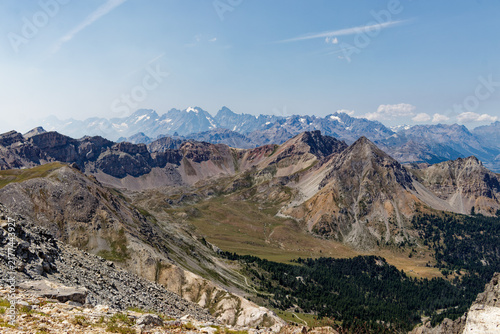 Obraz na plátně Vast rocky alpine landscape and scree slopes in the Queyras Regional Nature Park