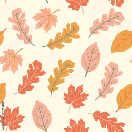 Autumn colorful leaves seamless pattern on milk background. Flat folk art vector wallpaper with pink, orange and yellow fall foliage for Thanksgiving kids textile, pastel wrapping paper design.