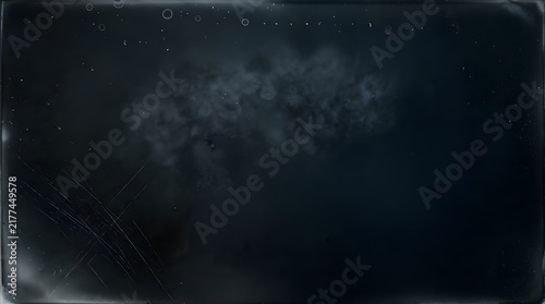 A dark abstract background featuring a midnight emulsion distress texture with subtle vintage film grain and weathered surface effects