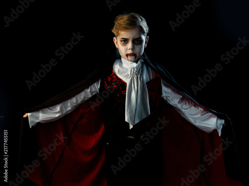 Konstfotografi A boy dressed in a vampire costume