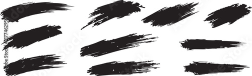 A collection of grunge style black ink brushstroke elements forming a versatile artistic brush set for design projects