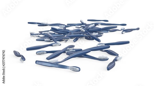 Many blue toothbrushes falling from above on white background