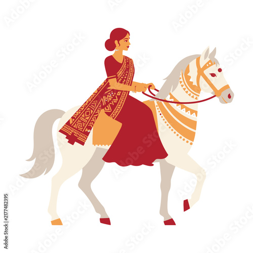Woman in traditional Indian attire riding white horse decorated with orange and red ornaments