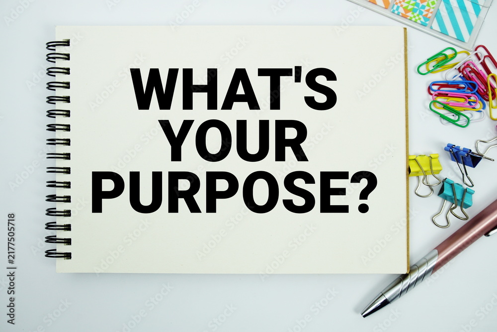 Obraz premium What's Your Purpose? text message written on notepad with stationery flat lay on white background